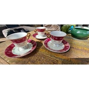 Porcelain set of 3 cups burgundy & gold Saucers